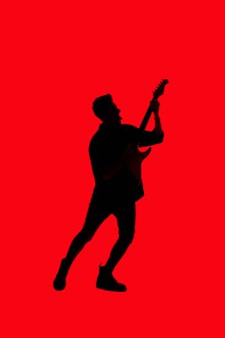 Çocukla bir elektro gitar