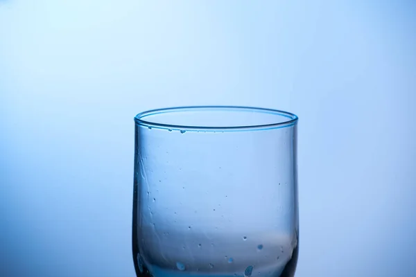 drinking glass of water or glass of water with undefined poison