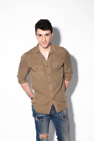 Young sportsman, probably professional mechanic or construction professional.