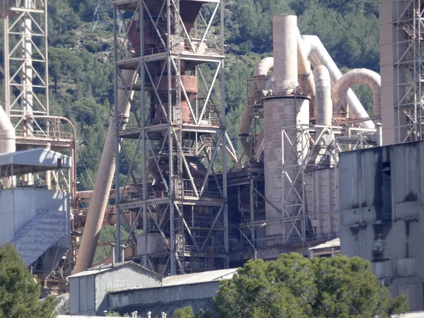 Cement factory in the middle of a mountain with cement ore quarries