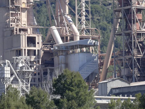 Cement factory in the middle of a mountain with cement ore quarries