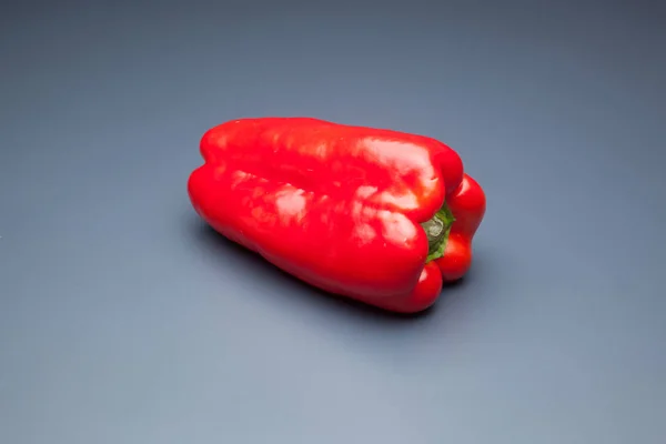 Green and red pepper, healthy vegetable full of vitamins, can be eaten raw or cooked, baked, fried, used to make stir-fry, can be filled with meat or other vegetables.