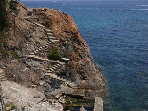 Stairs that give access to a small cove on the Costa Brava;