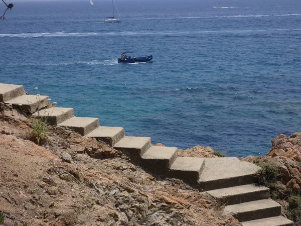 Stairs that give access to a small cove on the Costa Brava;