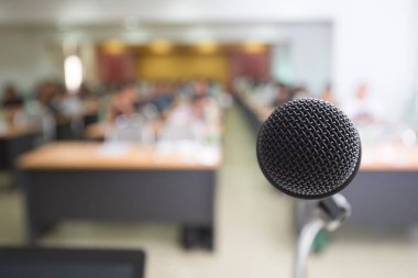Microphone in conference room for seminar and education clipart