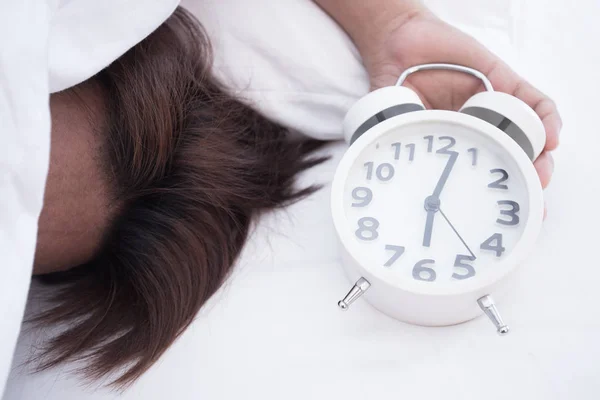 Man Sleeping White Bed White Alarm Clock Morning — Stock Photo, Image