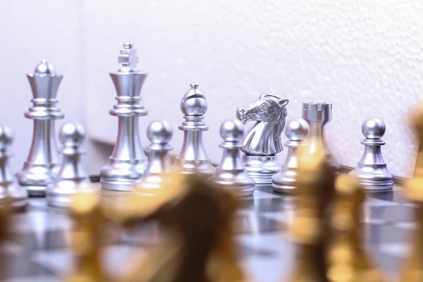 Chess, game of chess or board game with many type and characters. Gold and silver chess. Competition on business and education. Strategy concept