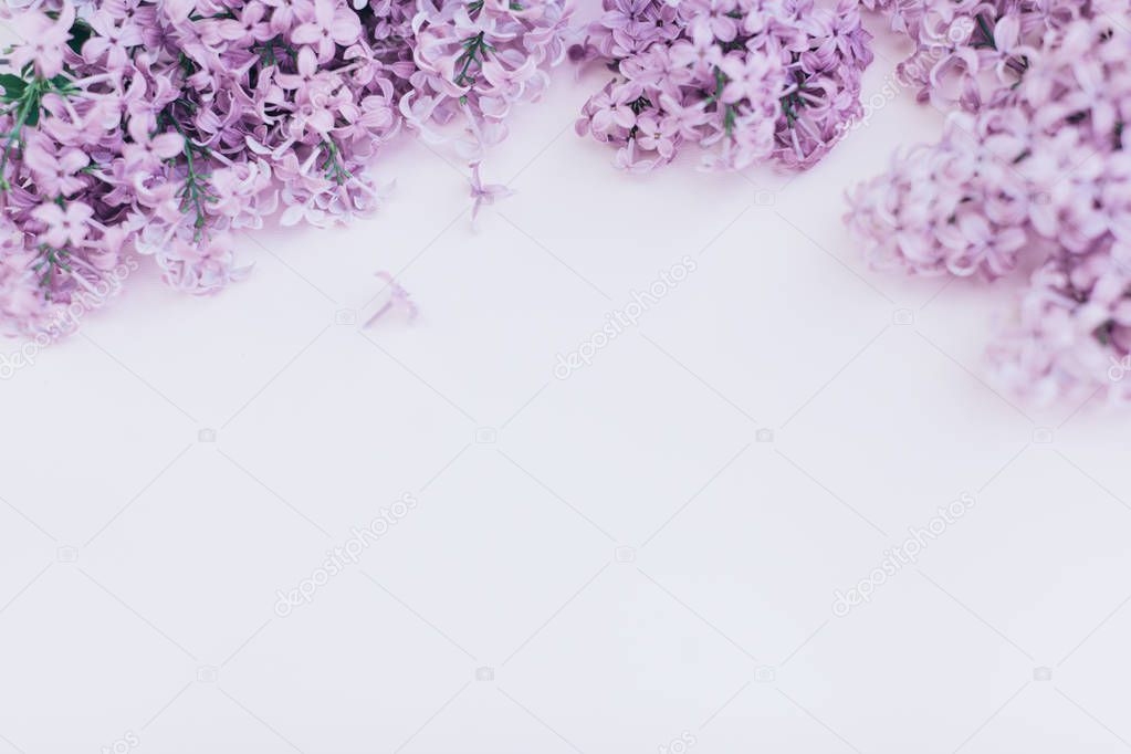 Beautiful floral border with lilacs. With copy-space.