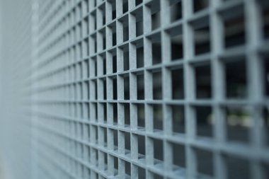 Küçük hücre kılavuz hisse senedi arka plan sığ dof ve seçici odak ile metal kafes 