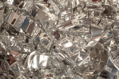 Gümüş parlak metalik folyo ambalaj tatil için arka plan. Noel doku