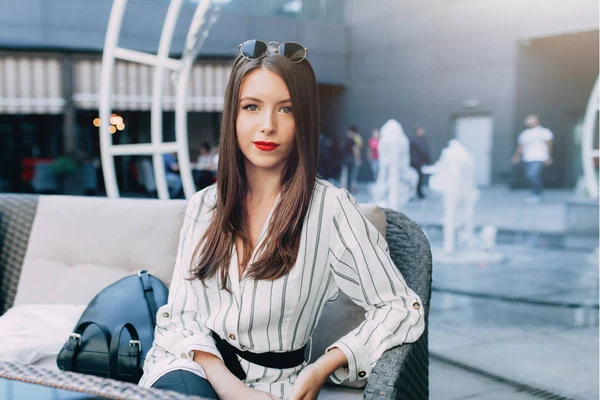 Young Beautiful Brown Haired Girl Dressed Striped Fashionable Dress Sitting — Stock Photo, Image