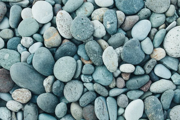 Abstract background with dry round peeble stones. Sea stone close up — Stock Photo, Image