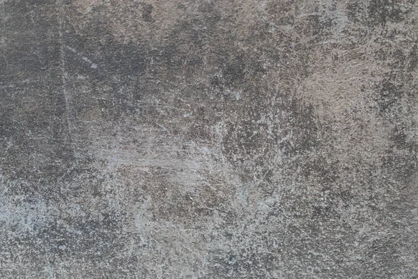 Tmavě šedá pozadí staré cementové zdi zblízka — Stock fotografie