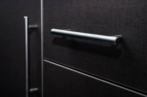 kitchen Cabinet drawer. metal drawer handle. Kitchen with modern design