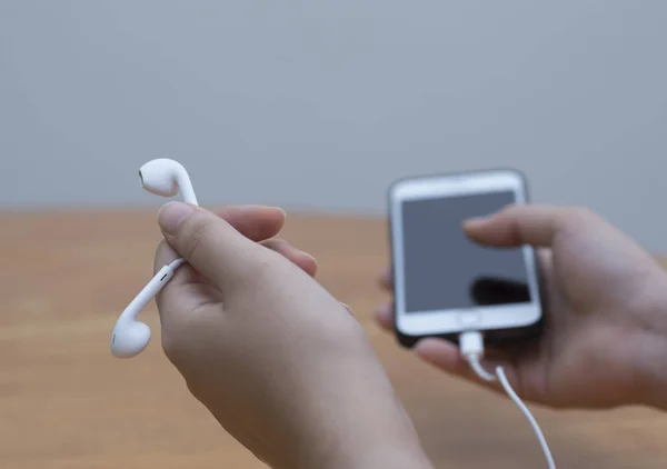 Small White Mobile Earplug — Stock Photo, Image