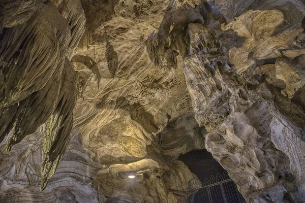 Texture of cave wall in limestone formation temple cave, Perak, Malaysia