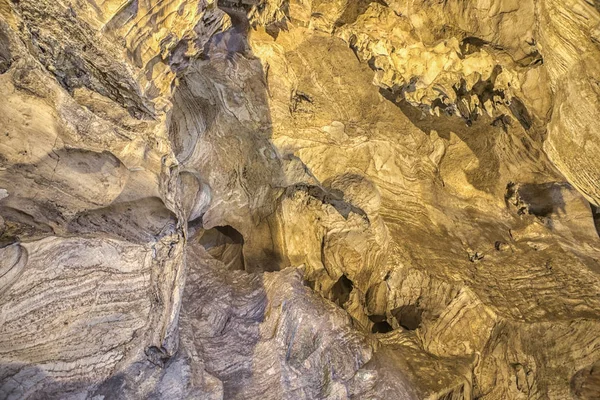 Texture of cave wall in limestone formation temple cave, Perak, Malaysia