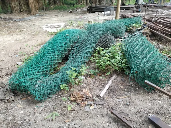 Green Pvc Coated Galvanized Steel Barbwire Fence Roll — Stock Photo, Image