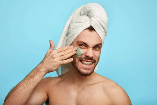 spa therapy for men. man trying to look perfect
