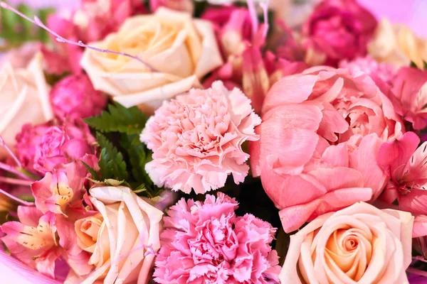 A bouquet of multicolored roses, lily, peony, carnation . Floral pattern. — Stock Photo, Image