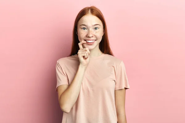Beautiful attractive smiling woman showing crooked finger — Stock Photo, Image