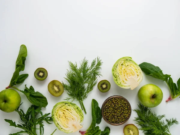 Green fruits and vegetables background.