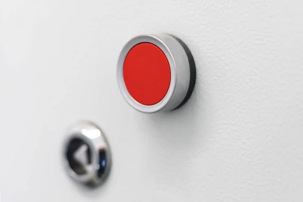 Red button lock on the gray panel — Stock Photo, Image