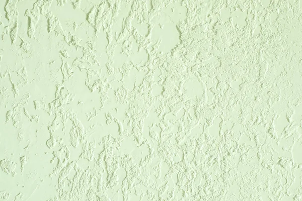 Light green textured plastered wall. Fresh otvetka in commercial premises, designer renovation in the house — Stock Photo, Image