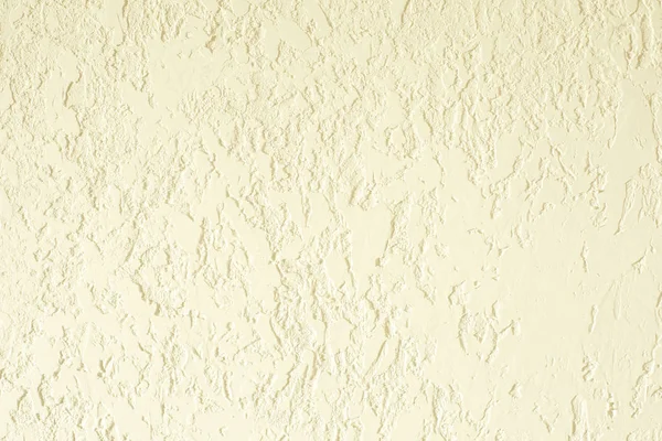 Colore sabbia strutturato parete intonacata. otvetka fresco in locali commerciali, ristrutturazione di design in casa — Foto Stock