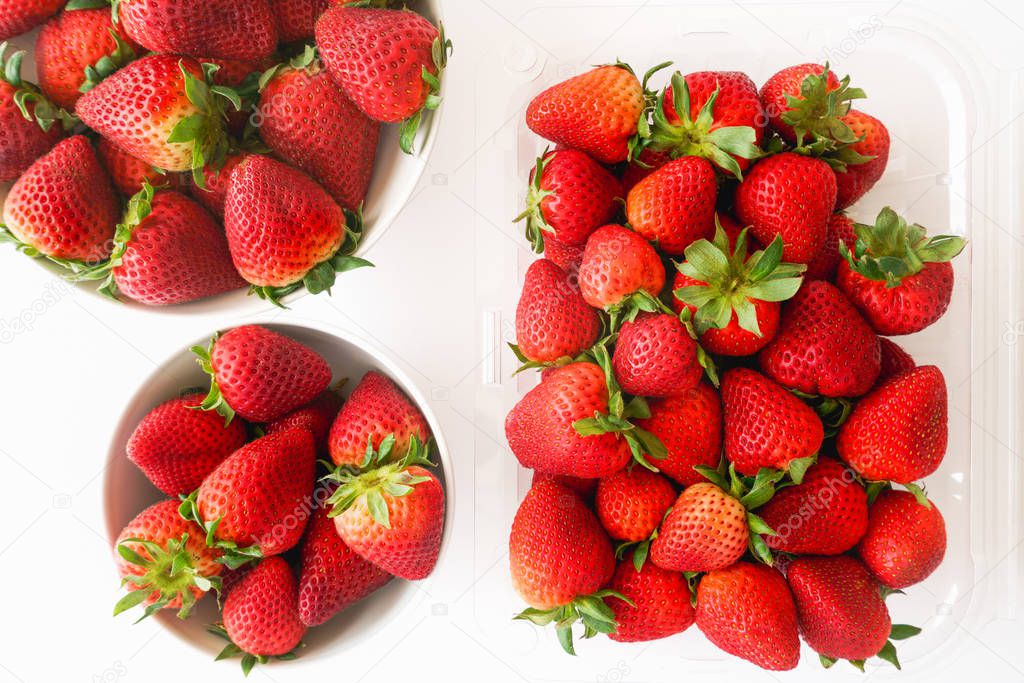 Strawberries in Box and Strawberries on a Plates, Close Up, Top View