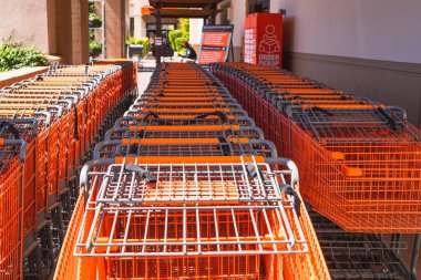 Santa Maria, California/USA - June 10, 2020  Shopping carts in a row in front of big shopping mall