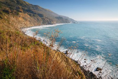 Scenic landscape. Cliffs and Pacific Ocean. Big Sur, California Coast clipart