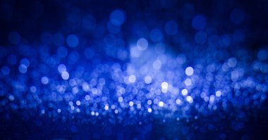 Bulanık soyut pembe ve mavi bokeh ışıklar. Noel tatili arka plan defocused