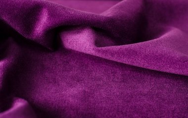 Parlak mor velour tekstil örneği. Kumaş doku arka planı