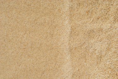 Deniz su dalgaları ile kum plajı kabarcıklar yukarıya kapatmak