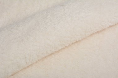 Soyut yapay doku kürk dokusu, arka plan, yakın plan. Yumuşak malzeme arka plan, çocuk oyuncakları sahte kürk.