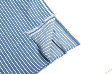 Mavi kumaş dokusu, yakın plan, arka plan. Dikiş ve terzilik için, elbise ve kumaş dikmek için