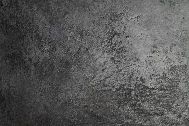 retro stone Concrete dark gray background with old absolete scuffs and black splashes. Grungy paint Textured floor or wall cement texture in the grunge style. Space for text clipart