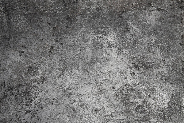 retro stone Concrete dark gray background with old absolete scuffs and black splashes. Grungy paint Textured floor or wall cement texture in the grunge style. Space for text