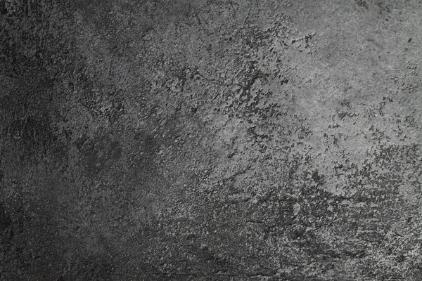 retro stone Concrete dark gray background with old absolete scuffs and black splashes. Grungy paint Textured floor or wall cement texture in the grunge style. Space for text