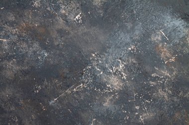 Retro taş beton, koyu kahverengi arka plan, eski sürtünmeler ve siyah lekeler. İğrenç boyanmış döşeme ya da grunge tarzında duvar çimento dokusu. Metin için boşluk