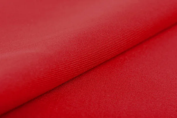 赤編み弾性生地 糸の質感の織り 折り目の折り目 スポーツ服や水着のために テキストのスペース — ストック写真