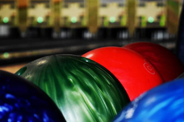 red green blue bowling balls