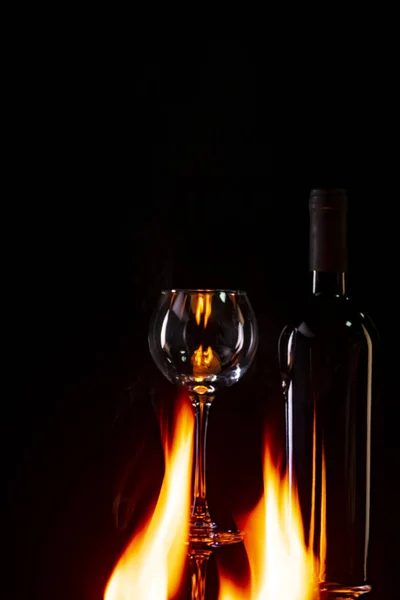 Bottle of wine on fire Royalty Free Stock Images