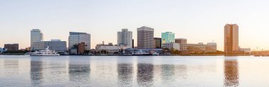 Norfolk, city in the state of Virginia, United States of America, as seen across the Elizabeth River, in the morning clipart