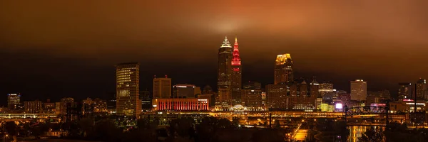 Cleveland, city in the state of Ohio, United States of America, at night, during low overcast sky