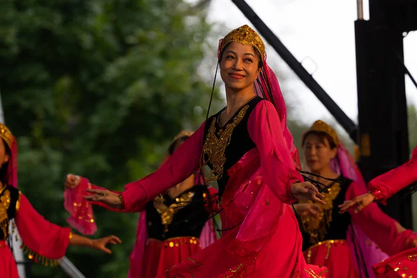 stock image St. Louis, Missouri, USA - August 25, 2019: Festival of Nations, Tower Grove Park, Members of the St. Louis Modern Chinese School, wearing traditional clothing, performing traditional dances from China