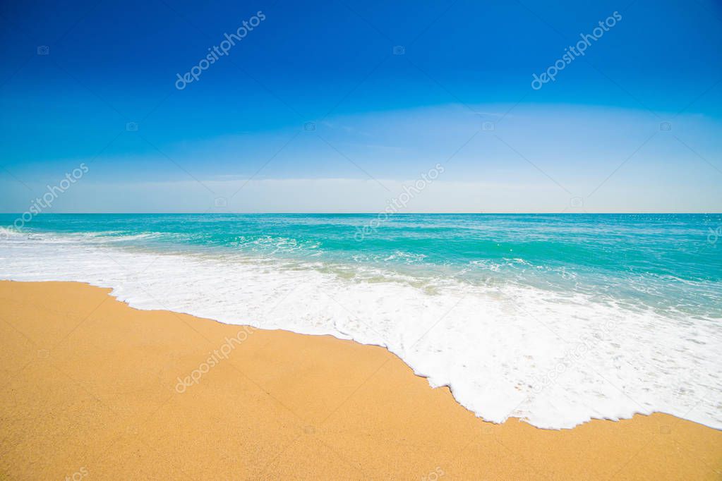 soft wave of blue ocean on sandy beach, summer travel concept 