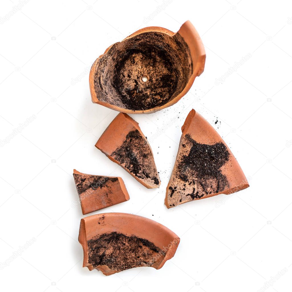 Broken clay flower pot isolated on white background, Damage concept 