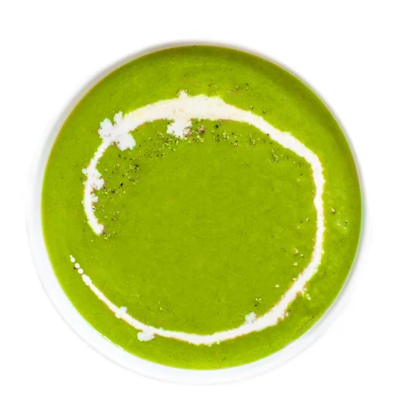 Broccoli and green peas cream Soup in a bowl isolated on white background with Spinach leaf, top view. Close up. — Stock Image Broccoli Green Peas Cream Soup Bowl Isolated White Background Spinach Stock Picture